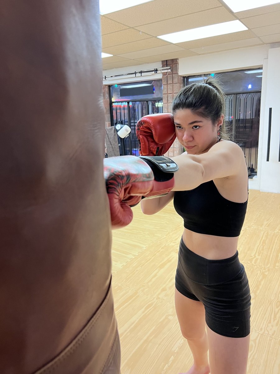 Jacquie ChenSmith training on the heavy bag