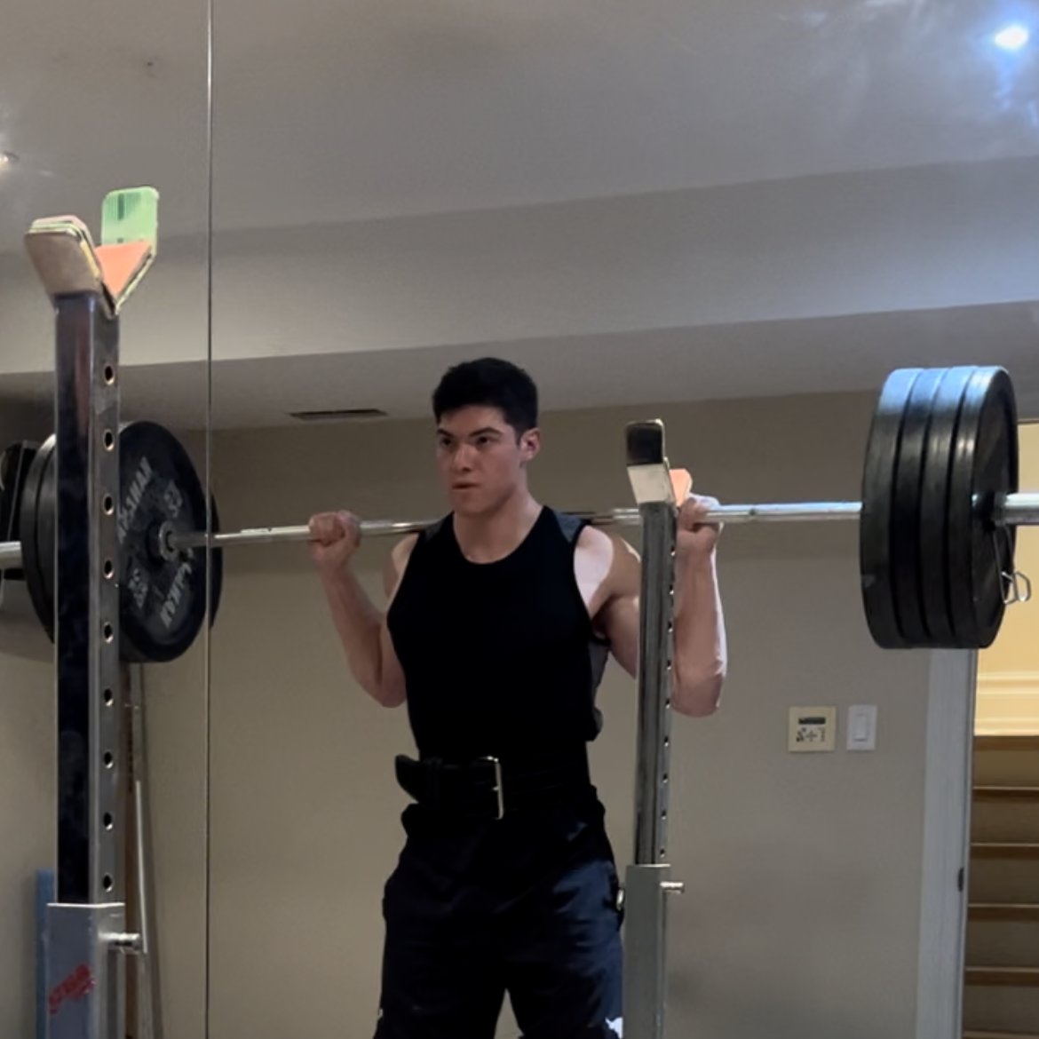 Stephen Smith performing a barbell squat